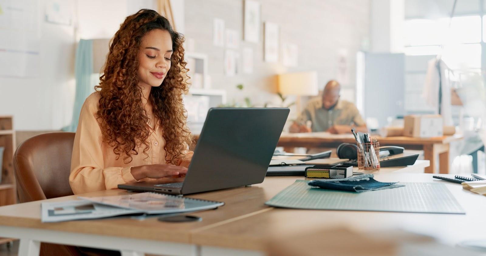 woman working on a laptop computer